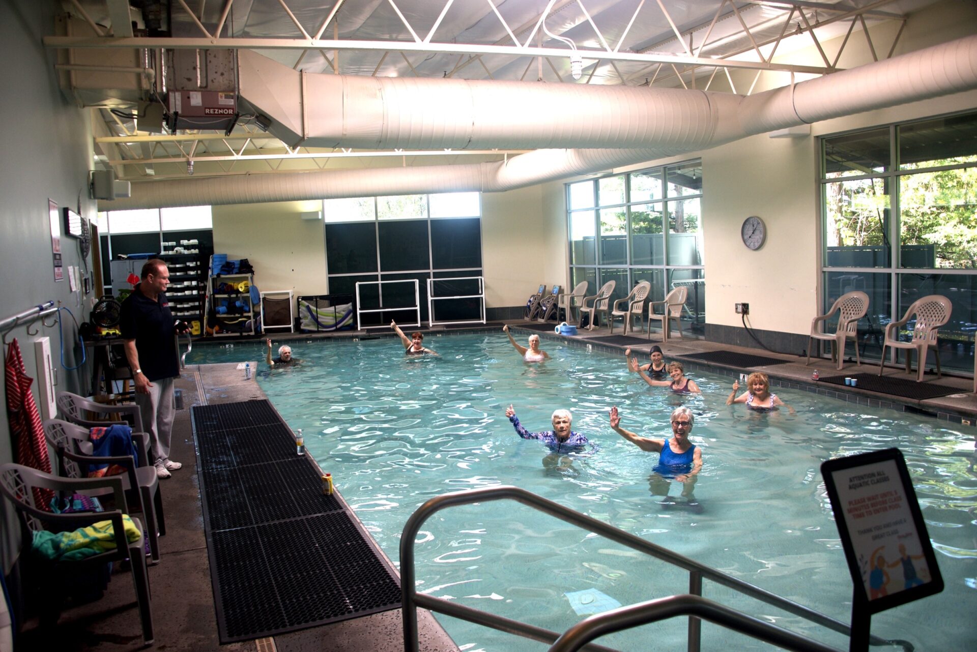 Seniors in an aquatic fitness class in the indoor pool